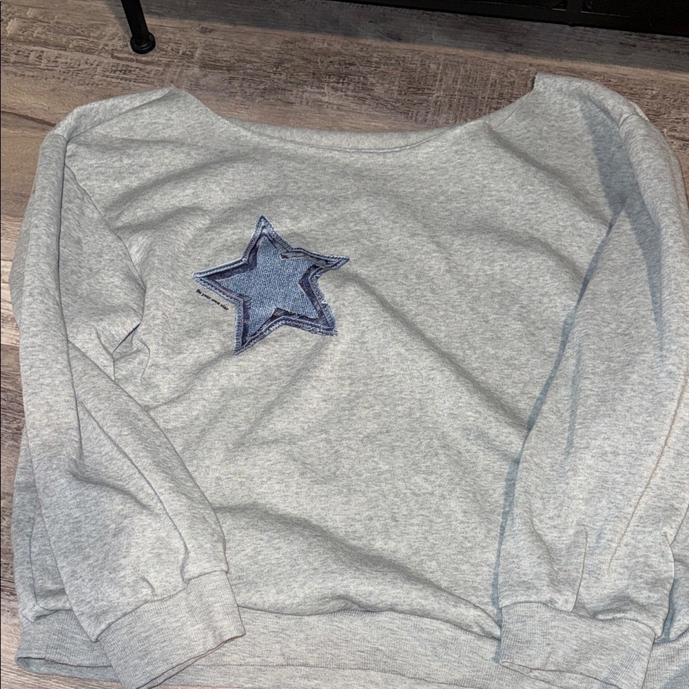 Gray Sweatshirt with Blue Star Patch